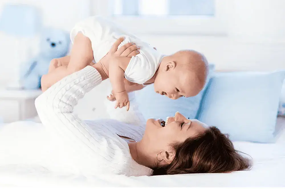 A mother holding her baby, illustrating the hope of parenthood